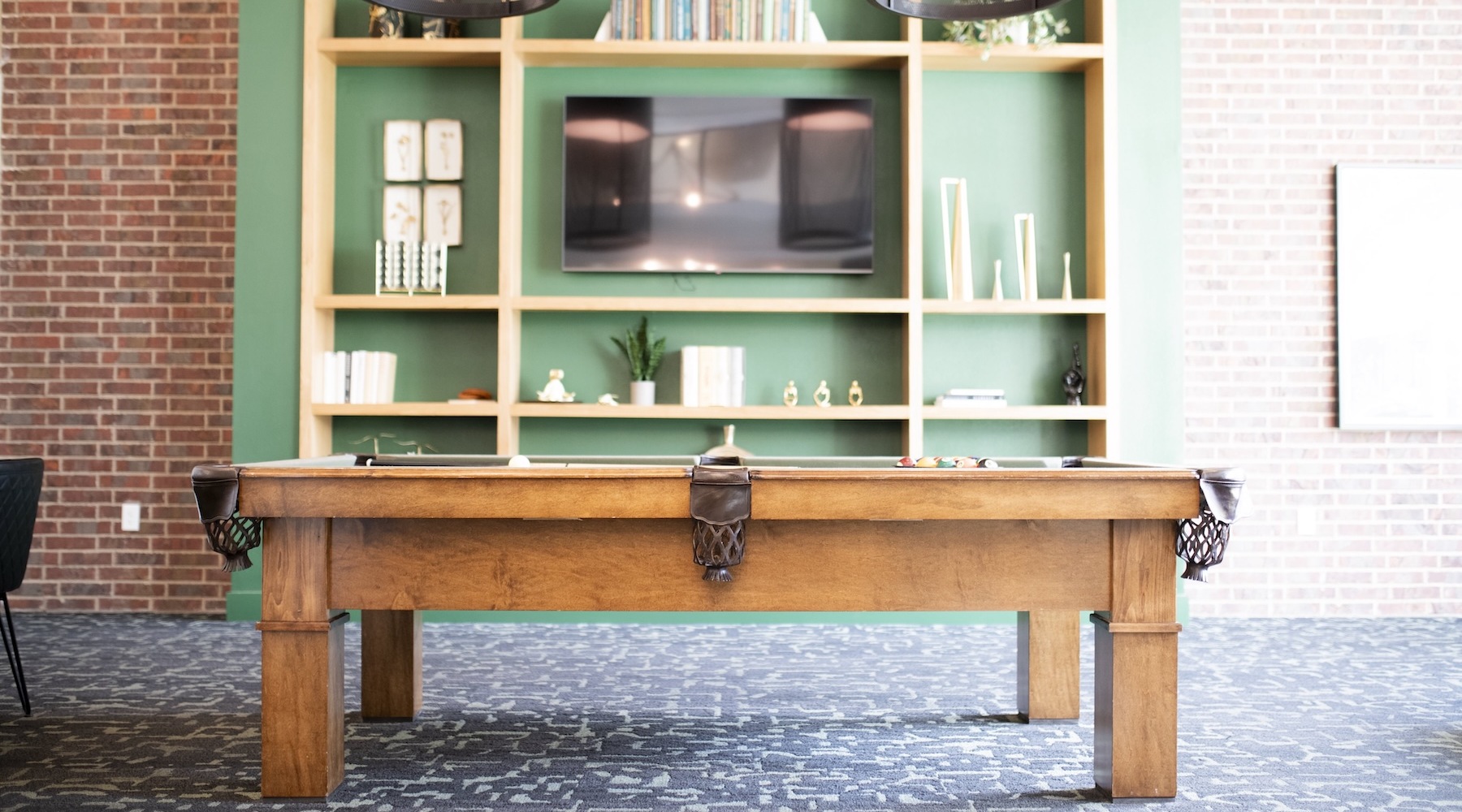 a game room with billiards